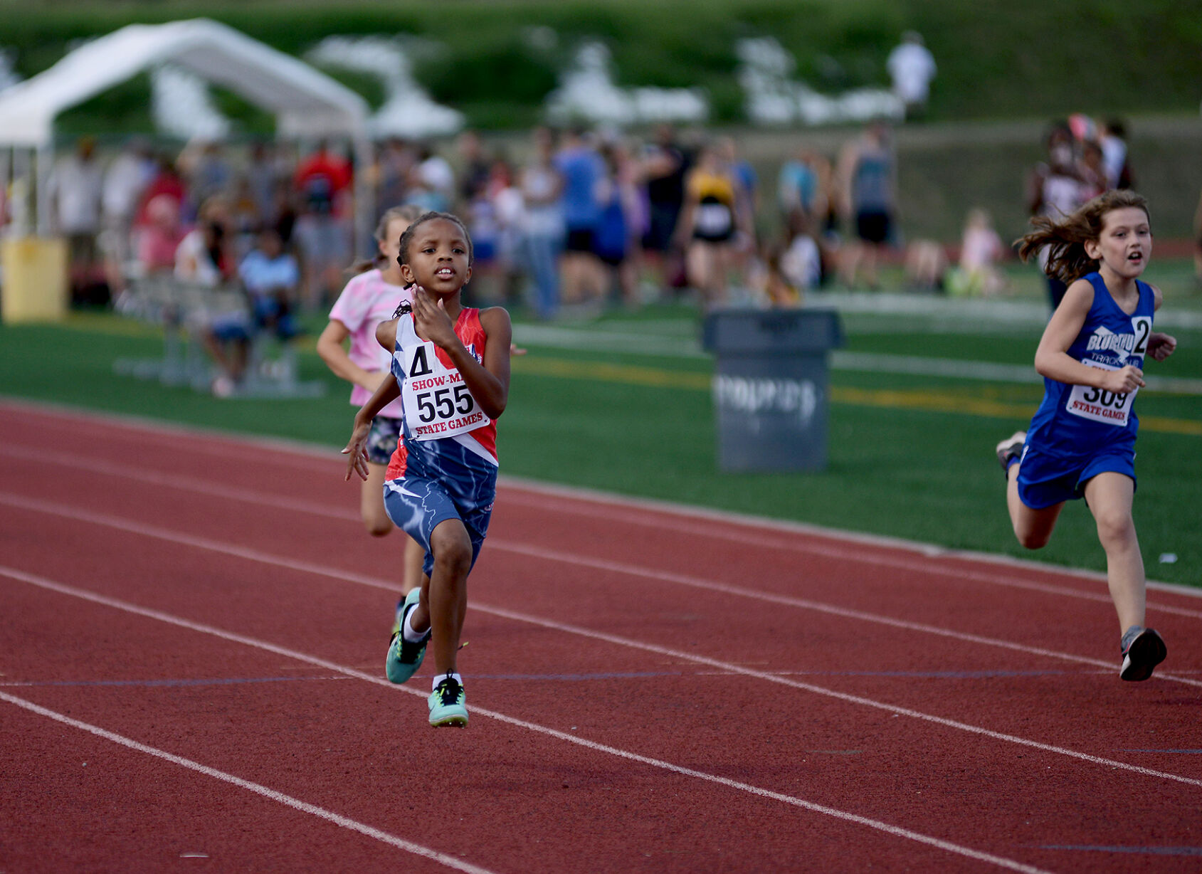Taliah Carnes, 6, competes in the 100 meters